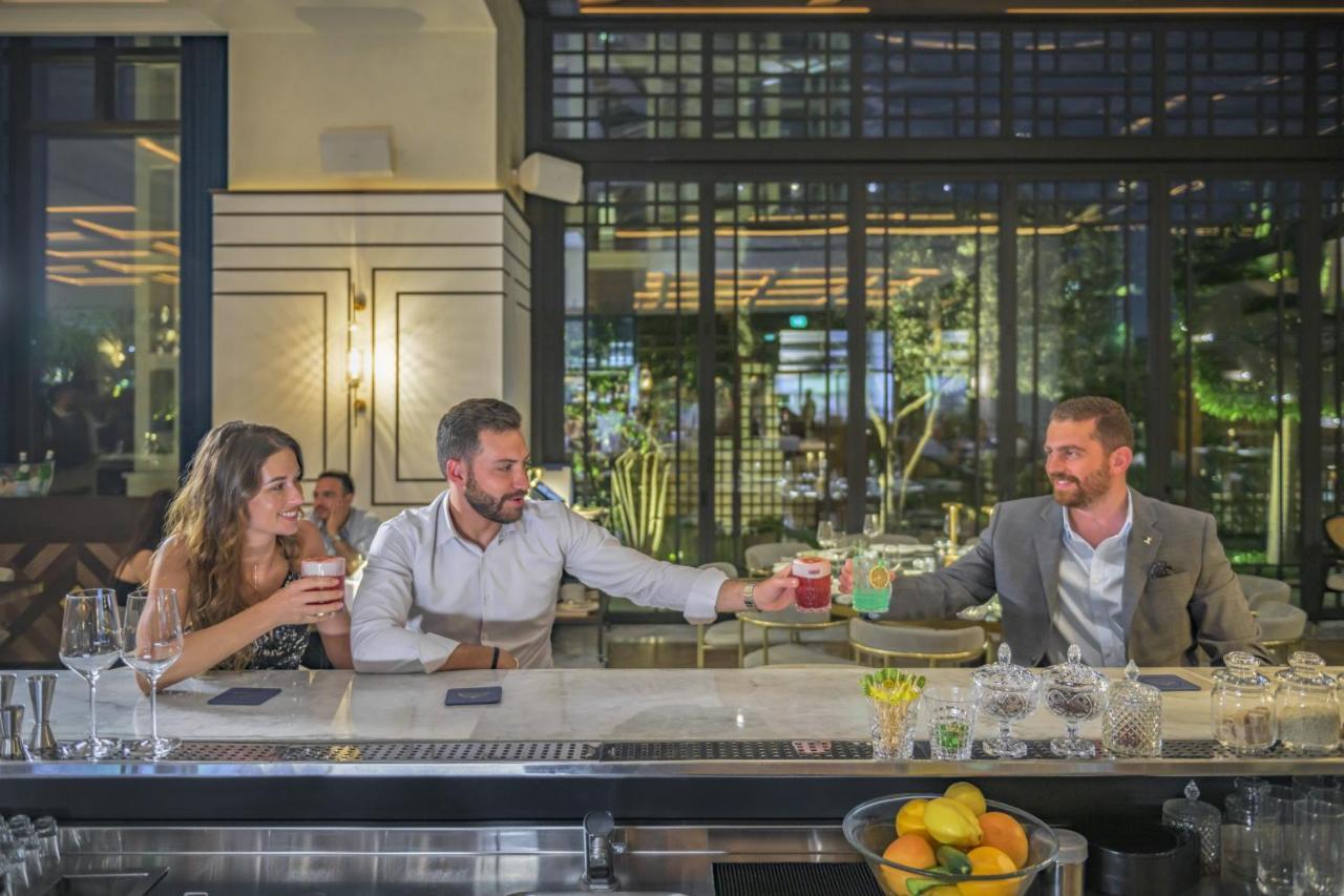 ホテル グランド ハイヤット アンマン エクステリア 写真 The bar at the hotel